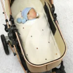Cozy Nordic Pompom Baby Blanket - Soft Knitted Swaddle Wrap - Image 3