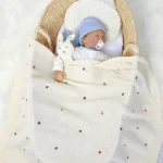 Cozy Nordic Pompom Baby Blanket - Soft Knitted Swaddle Wrap - Image 2