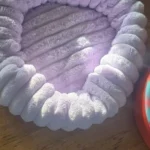 Cozy Plush Round Pet Bed for Medium Dogs & Cats - Winter Warmth photo review
