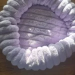 Cozy Plush Round Pet Bed for Medium Dogs & Cats - Winter Warmth photo review