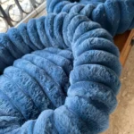 Cozy Plush Round Pet Bed for Medium Dogs & Cats - Winter Warmth photo review