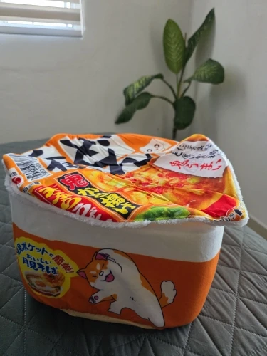 Cozy Noodle-Shaped Pet Bed: Plush, Breathable & Versatile Home photo review