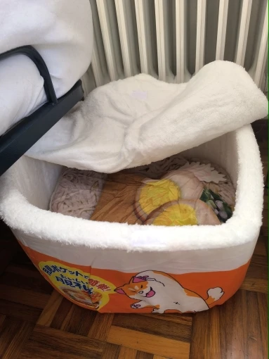 Cozy Instant Noodle Pet Bed for Dogs and Cats - Warm Nest photo review