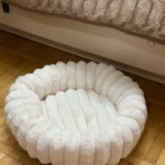 Cozy Plush Round Pet Bed for Medium Dogs & Cats - Winter Warmth photo review